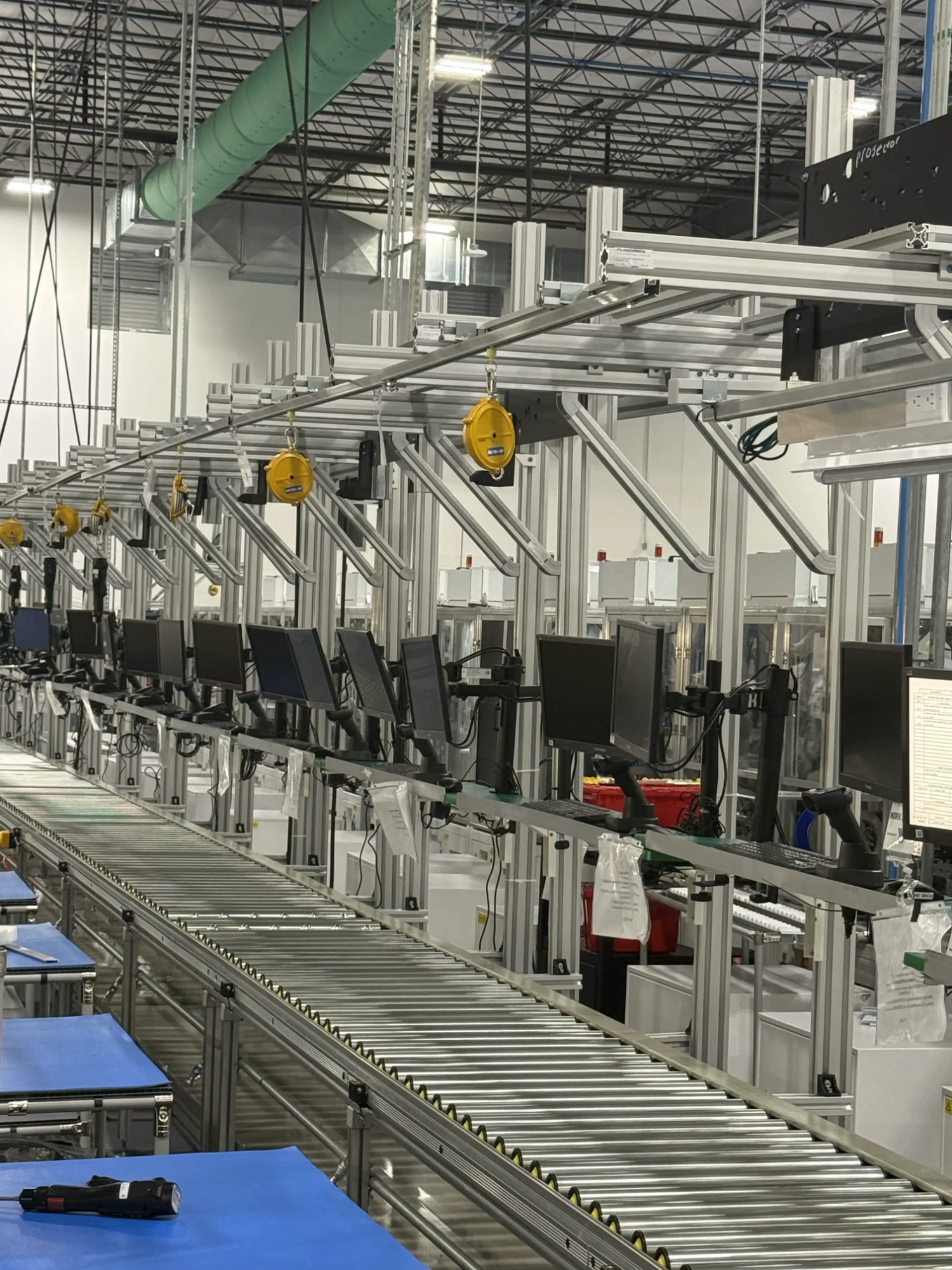 Close-up of workstations with monitors and scanners